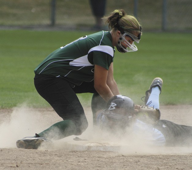 A member of Michigan's Central team tags out a runner from the Host team during the Junior Softball World Series on Thursday afternoon.