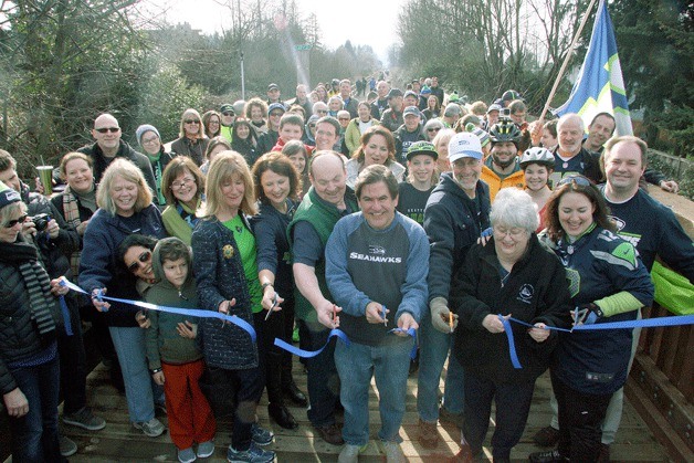 Kirkland City Council members cut the ribbon for the opening of the interim trail on the Cross Kirkland Corridor.