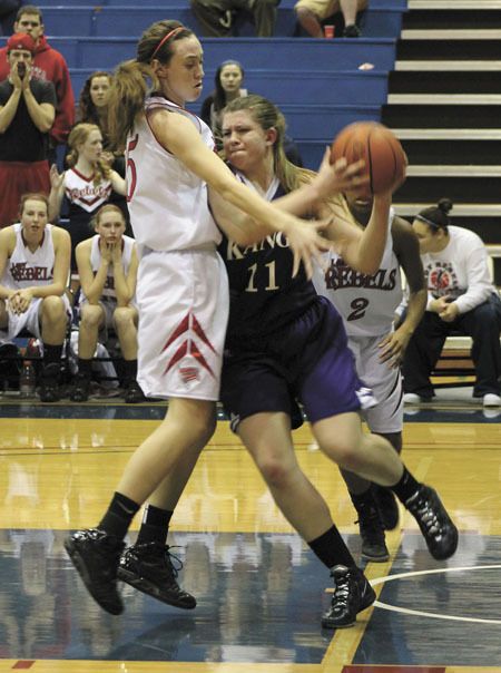 Juanita's Molly Grager tried to block Whitney Dunlap during the Rebels KingCo win over Lake Washington on Thursday