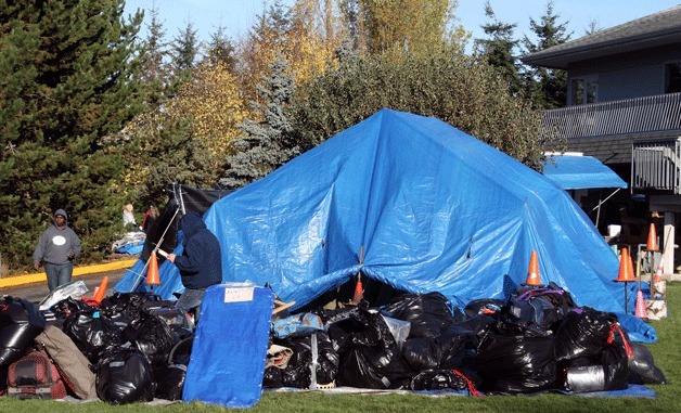 St. John Catholic Vianney officials and SHARE leaders agreed they will not enforce ongoing sex-offender checks for Tent City 4 residents