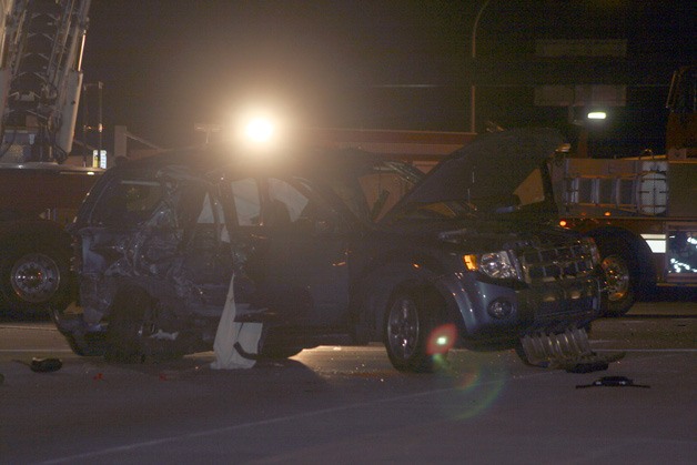 This SUV was struck by a Sound Transit bus Monday night on the N.E. 128th Street overpass in Kirkland. Two people riding in the SUV were killed.