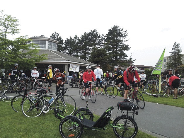 Bicyclists register and prepare for the ride at the 7 Hills of Kirkland in 2013.