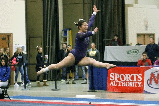 Lake Washington High School ahtlete Nadia Popovici competed on bars and vault and tied for 24th on floor with a score of 9.125 during the state meet.