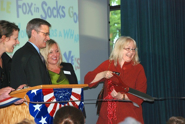 Mayor Joan McBride cuts the ceremonial ribbon at John Muir Elementary's grand opening. City Council Member Amy Walen