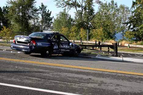 A Kirkland police officer lost control of his vehicle early Thursday morning on Waverly Way in Kirkland while responding to a call. Police said that the rain-slicked road contributed to the crash.