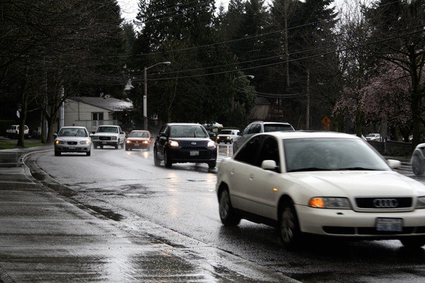 Cars flow freely Friday afternoon north and southbound in the 's-curve' on N.E. 120th Place