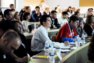 Audience members listen during a community project presentation for Leadership Eastside at the Lake Washington Technical College campus in Redmond May 14.