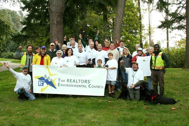 Volunteers helped restore Everest Park on Oct. 14 as they cleared native plants around the creek. The work was part of the annual planting project of The Realtors Environmental Council.