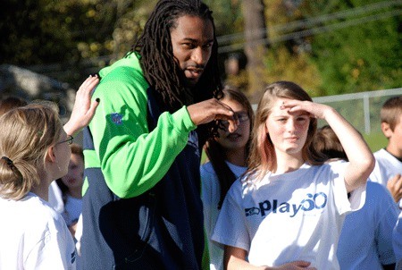 Seattle Seahawk Isaiah Stanback came to Peter Kirk Elementary to speak with 5th and 6th graders about getting 60 minutes of exercise each day - Play60.