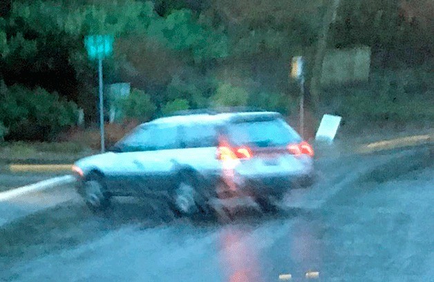 This photo shows a car leaving the scene of a hit-and-run bicycle accident in Kirkland.