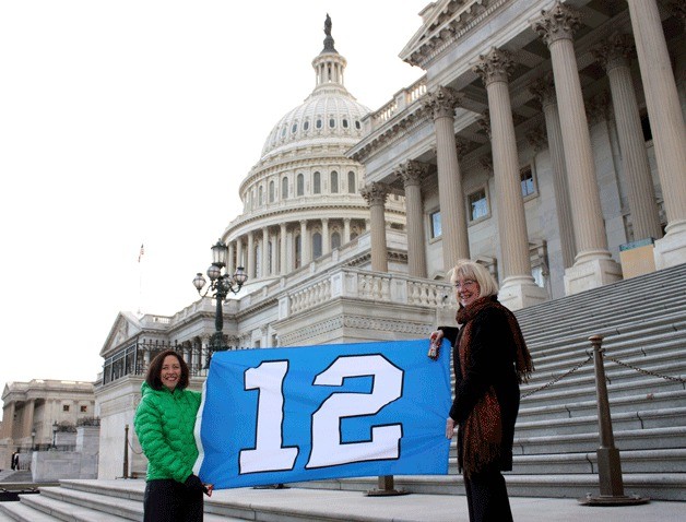 U.S. Senators Patty Murray and Maria Cantwell show their 12th Man pride on the steps of the Capitol in Washington D.C.