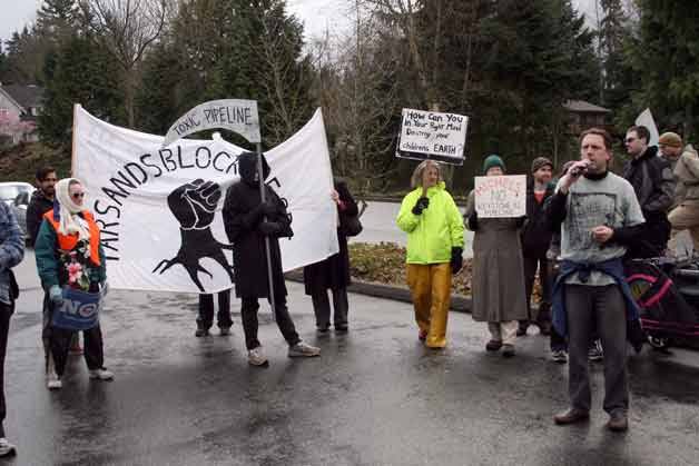 About 40 protesters assembled on Monday morning at the Kirkland offices of the Michels Corporation