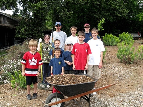 Some of the Cub Scouts and other volunteers who gave Cedar View Park a spring cleaning on May 31.