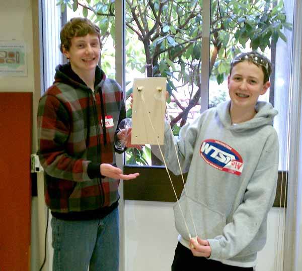 Finn Hill Junior High students Alex Shinstrom (right) and Alex Tuck (left) won first place in the problem-solving event during the WTSA district competition on Jan. 28.