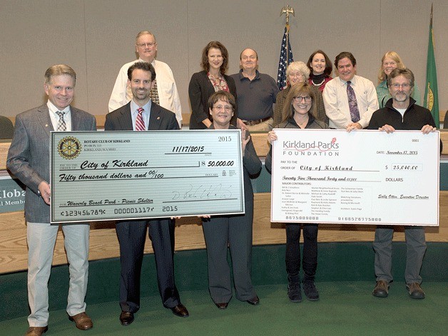 The Rotary of Kirkland and the Kirkland Parks Foundation each presented the city of Kirkland with checks at the Kirkland City Council meeting on Tuesday. The funds are to go toward the improvements of Waverly Beach Park.