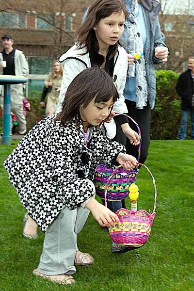 Youngsters hunt for Easter treats outside the Woodmark Hotel during the Easter Egg Scramble last year.