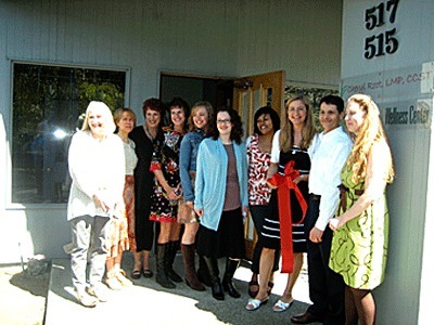 Synergy Wellness Center staff and city leaders recently held a ribbon-cutting to welcome the new business. (From left) Kirkland Mayor Joan McBride