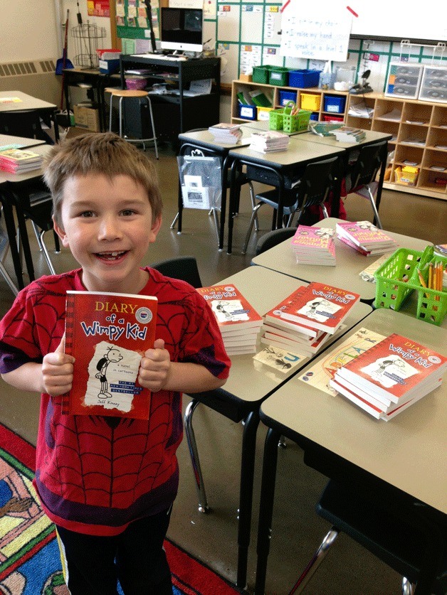 Kirkland student Maguire Brooke gave books in help other kids instead of receiving presents for his 7th birthday.