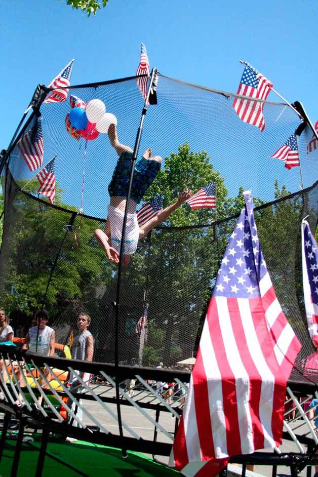 A parade participant flips during Kirkland's annual 4th of July celebration in 2011.