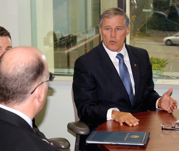 Gov. Jay Inslee speaks with Reporter Newspapers’ staff about state transportation issues during a meeting in Bellevue on Oct. 18.