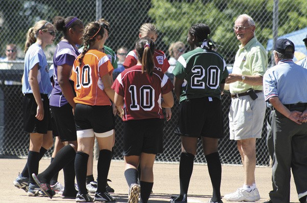 A member of each team playing at the JSWS recited the Little League oath with tournament director John Chadwick during the 2010 opening ceremonies in Kirkland.