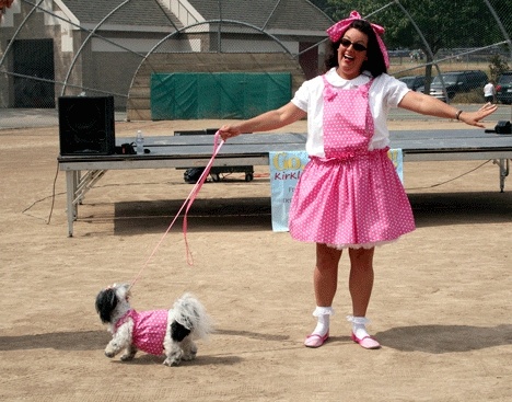 Pretty in pink pair Kimmy Sanders and her pooch