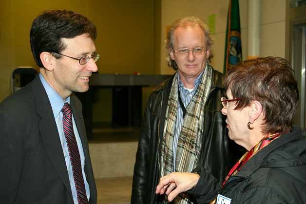 King County Council member Bob Ferguson (left) talking with members of the Kirkland community during a town hall meeting on Wednesday.