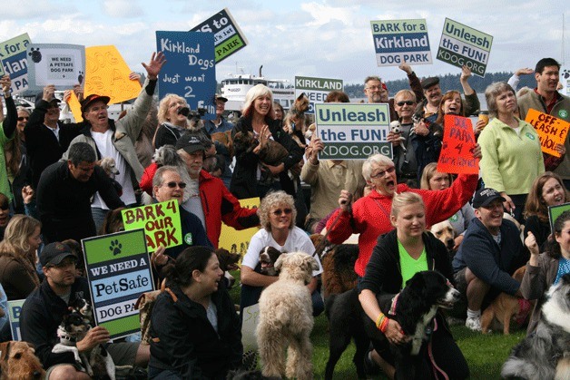 Nearly 100 residents unleash their enthusiasm to get Kirkland's first-ever off-leash dog park built during a rally at Marina Park Saturday. The event was part of a video filmed by city staff to show the community's support for the dog park. The video will be submitted to PetSafe's National Dog Park Contest