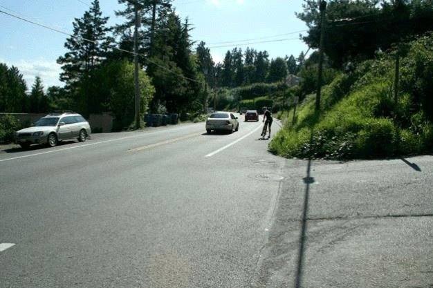 Several thousand drivers and bicyclists use Juanita Drive each day navigating its steep topography and curving alignment.