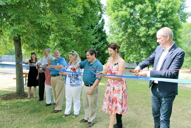 City officials and Google representatives cut the ribbon for the new wifi at Everest Park in Kirkland. From right