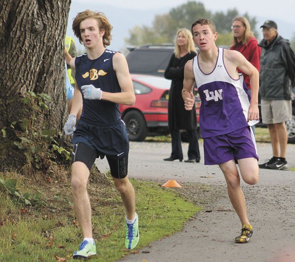 Lake Washington's Devon Grove runs around a corner