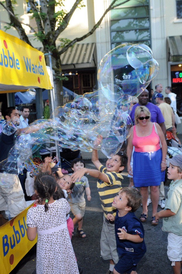 Children play with bubbles at last year's first Summerfest