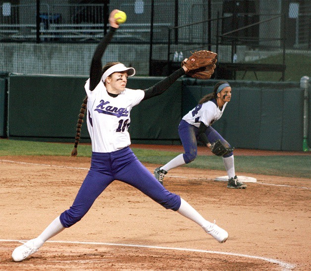 Lake Washington High School softball pitcher Tori Bivens picked up the win during the rivalry game at the University of Washington.