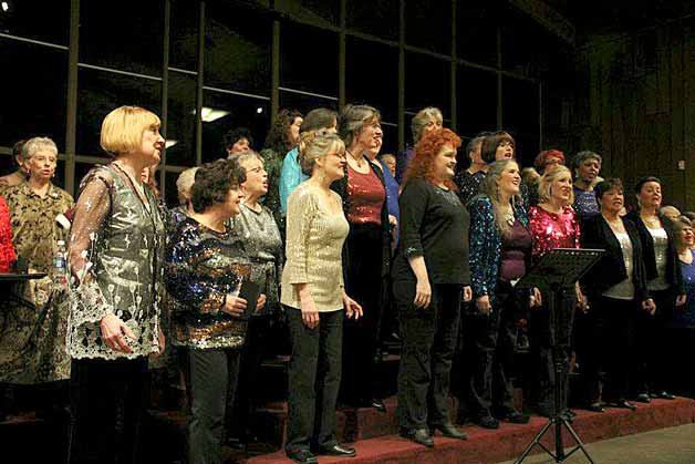 The Pacific Sound Chorus sings during a holiday celebration at East Shore Unitarian Church in Bellevue on Dec. 13. The Chorus was joined by Kirkland's Lyrica Choir.