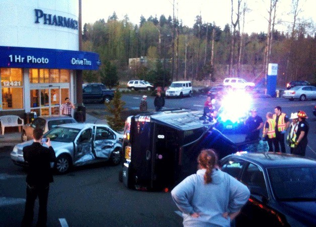 Kirkland firefighters responded to a rollover accident in the Rite Aid parking lot of the Totem Lake neighborhood Monday night.