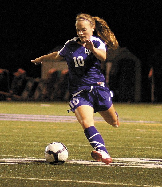 Tori Varyu passes to a teammmate during Lake Washington's 1-0 overtime win against Mount Si last week. Varyu's cross to Emma Holm made the game winning goal.