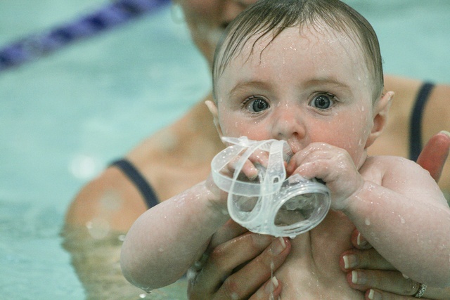 Five-month-old Anna Makovski is held by her mother