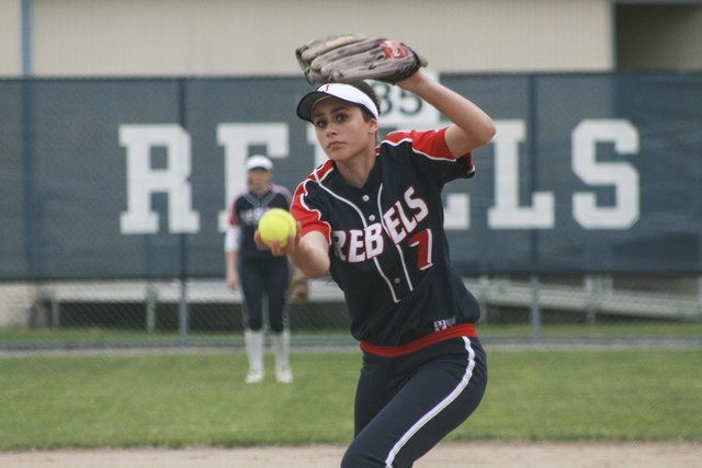 Juanita pitcher Megan Murray winds up midway through the Rebels’ 13-3 win over Sammamish on Thursday