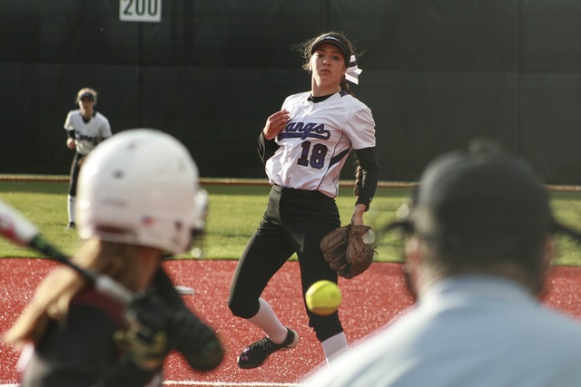 Lake Washington’s Tori Bivens watches a pitch all the way to the plate during the Kangaroos’ 10-0 win over Mercer Island on Friday