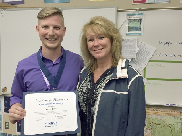 Owen Jones was honored by the Kiwanis Club of Kirkland for his work with the Builder’s Club advisor at the Kirkland Middle School. Jone is with the Kiwanis President Kat Cannon. Contributed photo