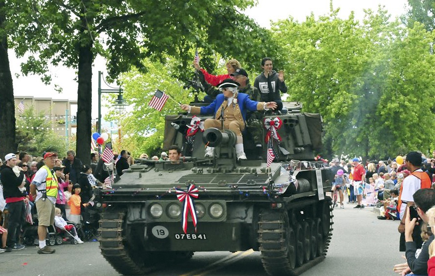 Onlookers take in the sights during the annual 4th of July parade in downtown Kirkland. Photo courtesy of Todd Stefan.