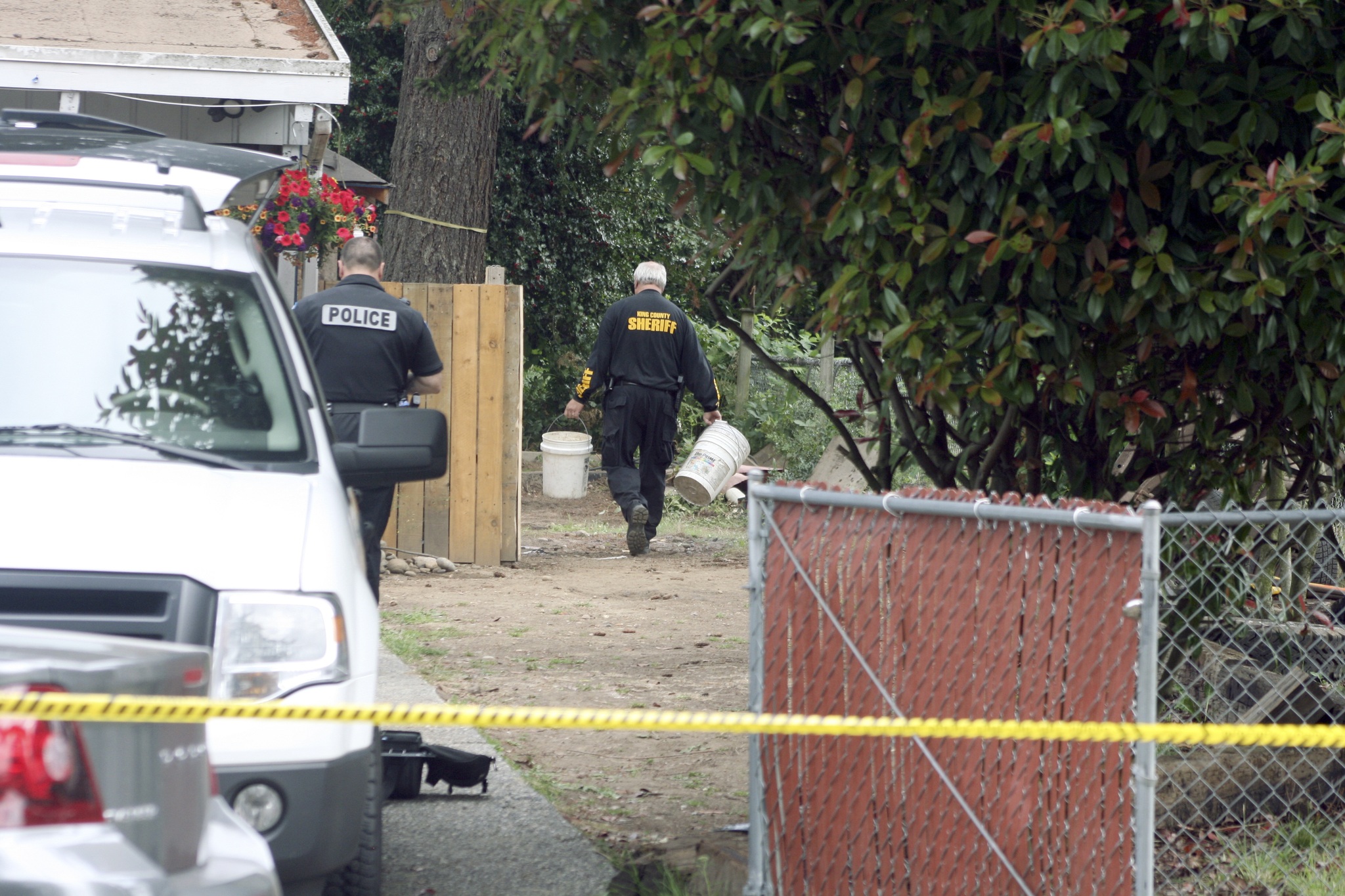 King County Sheriff's deputies search the back yard of a home on the Kenmore and Kirkland boundary for clue to the whereabouts of Jammie Haggard