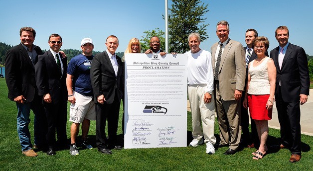 The King County Council with representatives from the Seattle Seahawks.