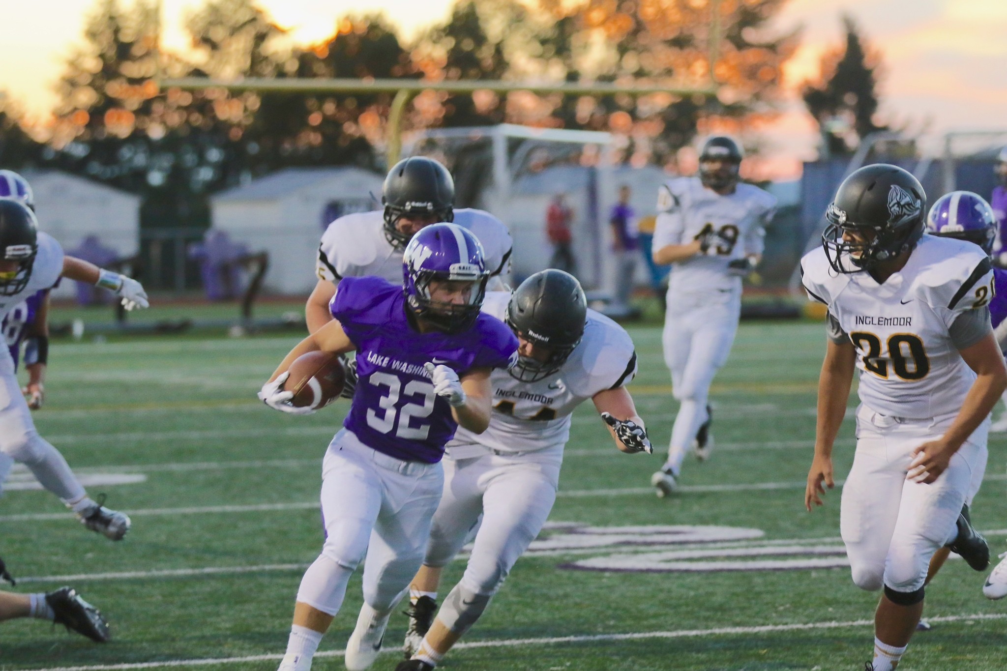 Lake Washington junior Ryan Clifford eludes Inglemoor tackler during the Kangs’ 31-21 victory over the Vikings on Friday