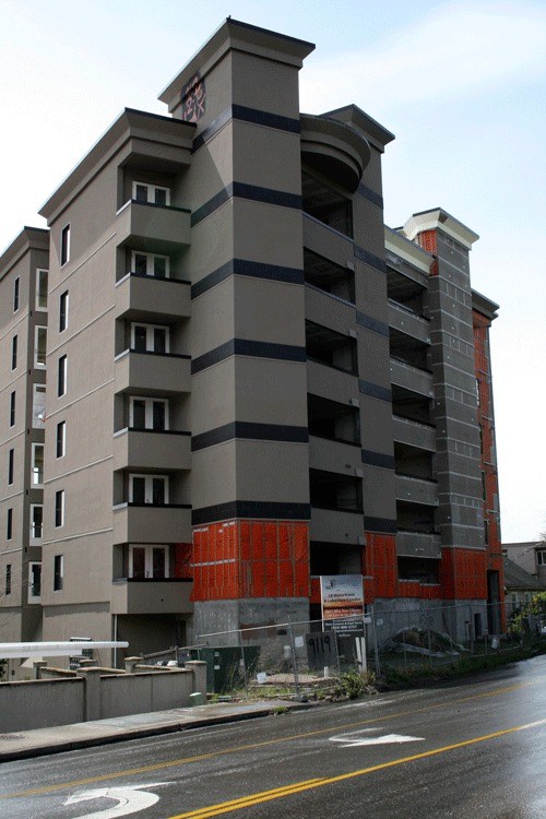 The Bel Lago Condominium sits on the banks of Lake Washington and is the fourth tallest building in Kirkland. The building was foreclosed on in December and has not been completed.