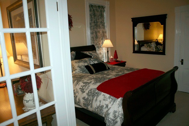 The Loomis House Bed and Breakfast suite includes a sitting area and bedroom that are divided by French doors. This is the city’s only bed and breakfast.