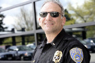 Katherine Ganter/Reporter Newspapers Kirkland Police Lieutenant Mike Ursino was recognized by the city last week for 25 years of service.