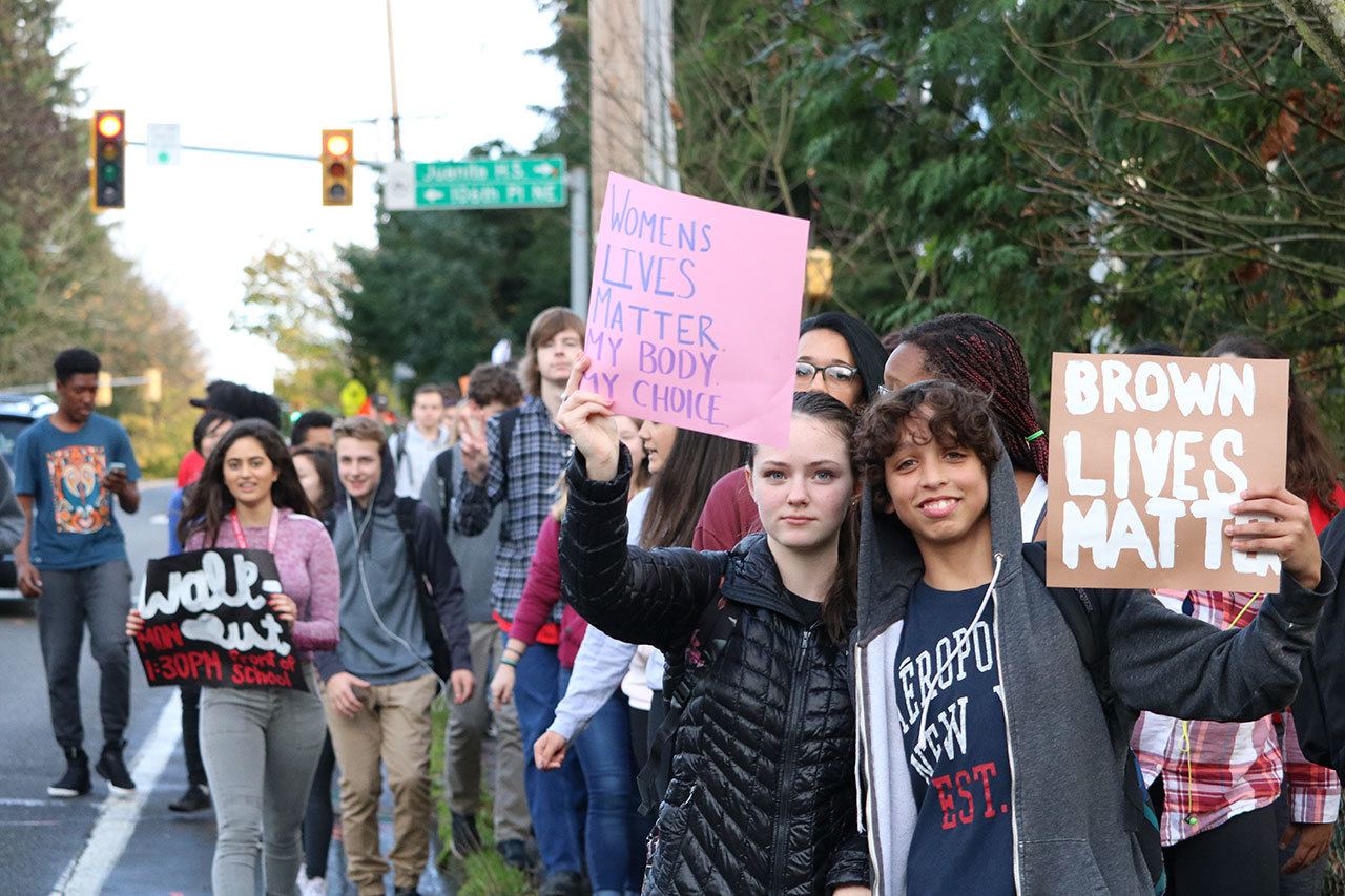 Juanita High School students walk down 132nd Street as part of a protest on Nov. 14. JOHN WILLIAM HOWARD/Kirkland Reporter