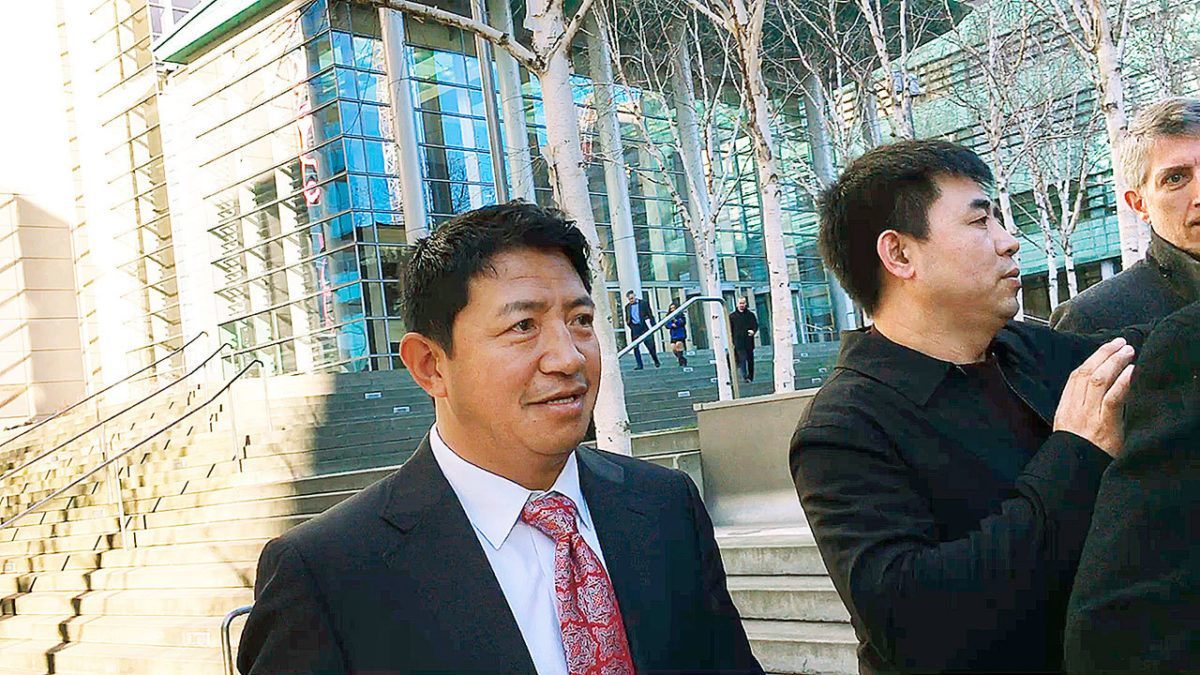 Lobsang Dargey outside the US District Court building in Seattle on Wednesday. Dan Catchpole/Everett Herald